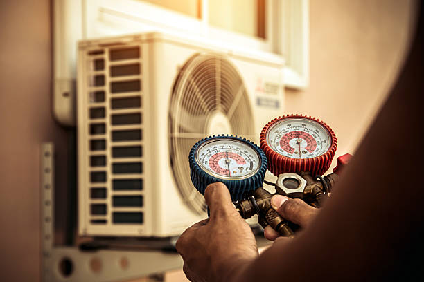 Professional Ac Installation technician working in Trenton, OH